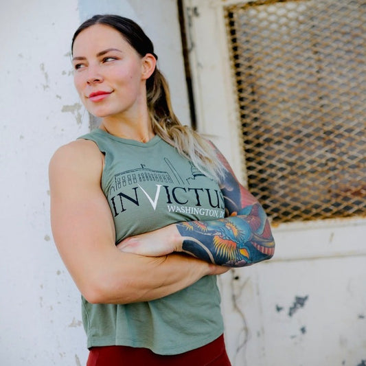 Woman wearing muscle tank top in gym